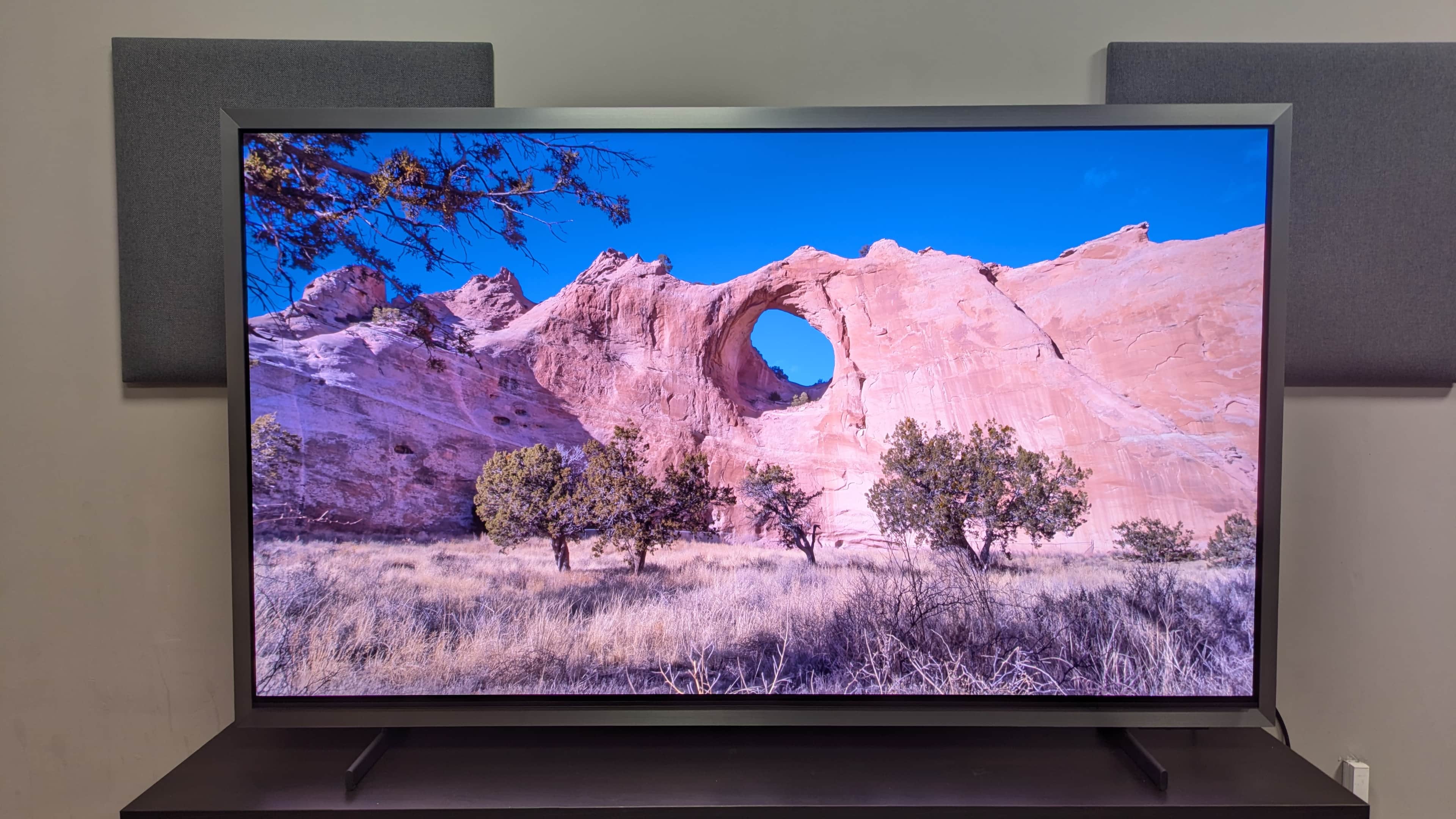Samsung S95H showing a canyon and cliffside on a bright day