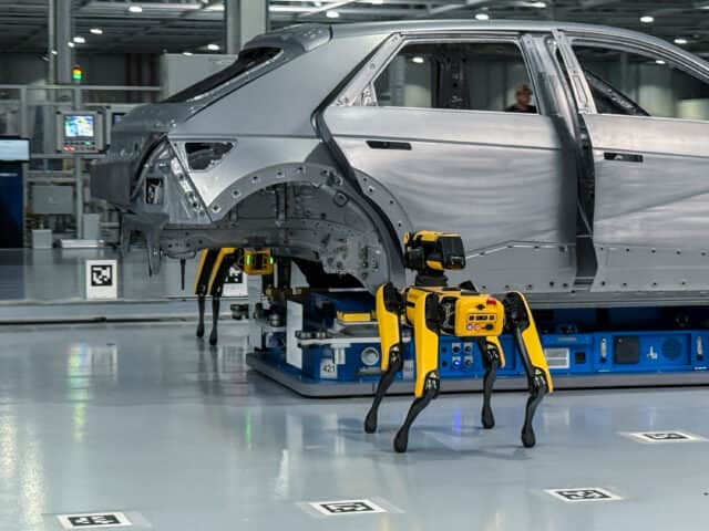 A pair of Boston Dynamics robots inspect a Hyundai Ioniq 5 body shell at the Hyundai Motor Group Metaplant outside Savannah, Georgia.