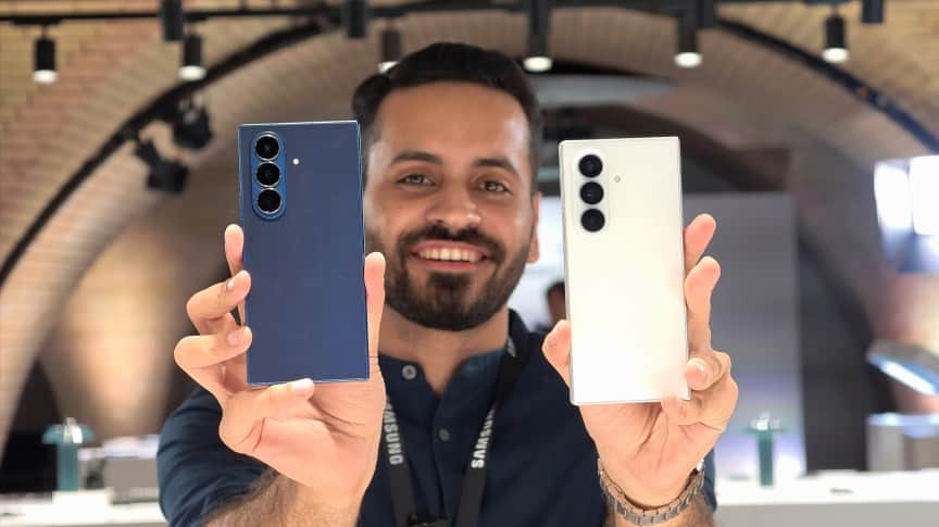 Holding the Z Fold 8 Ultra and the Z Fold 7.