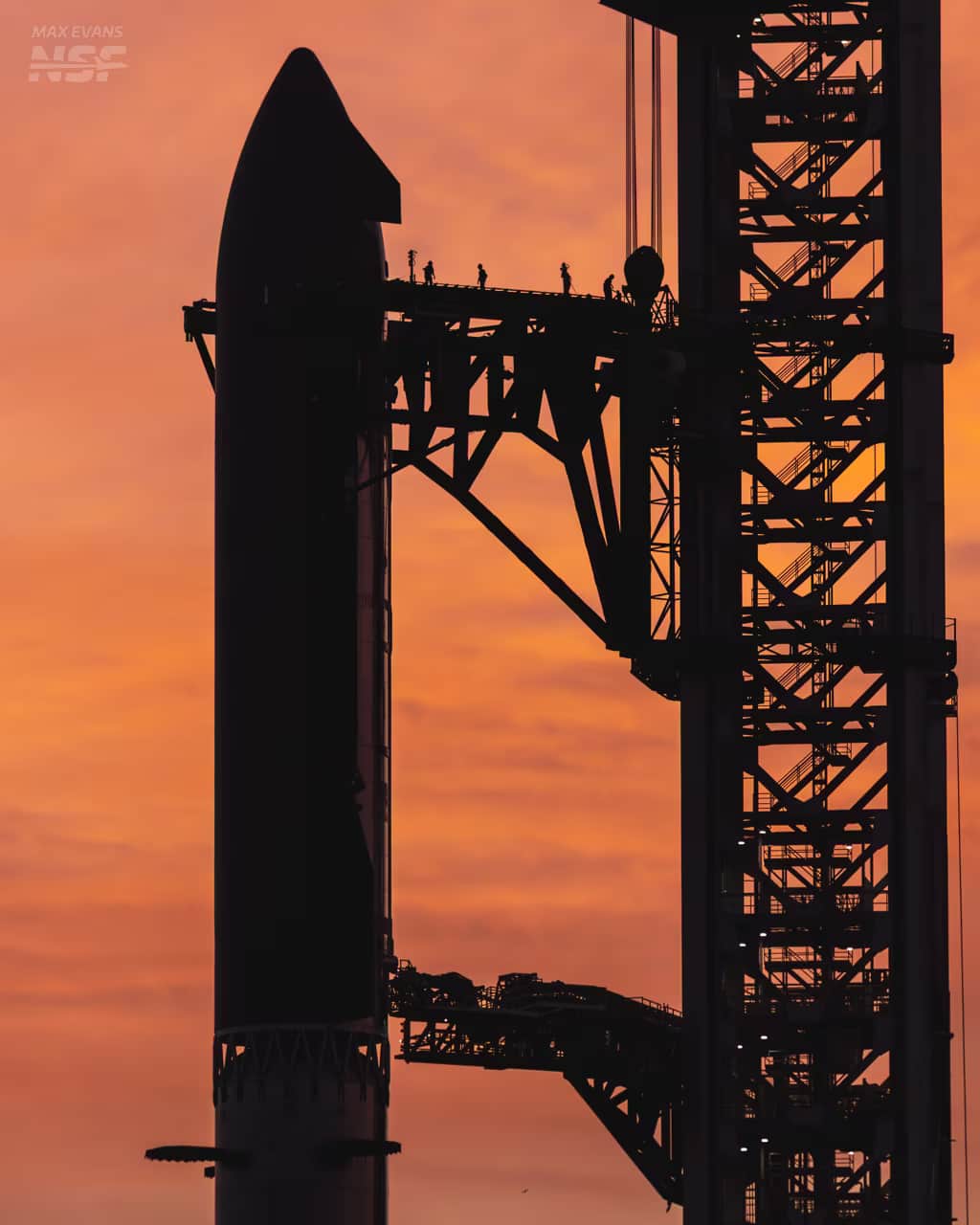 Starship V3 awaits a nighttime launch at Starbase after the previous attempt was canceled