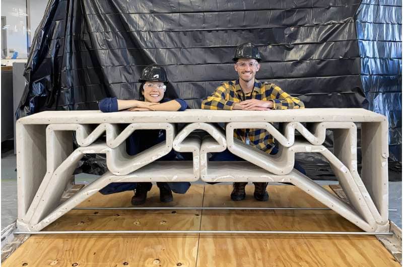 During testing, the roughly 900-pound bridge held more than 2,000 pounds of concrete blocks spread across its top without measurable bending, closely matching the simulations. Credit: Photo courtesy of the researchers.
