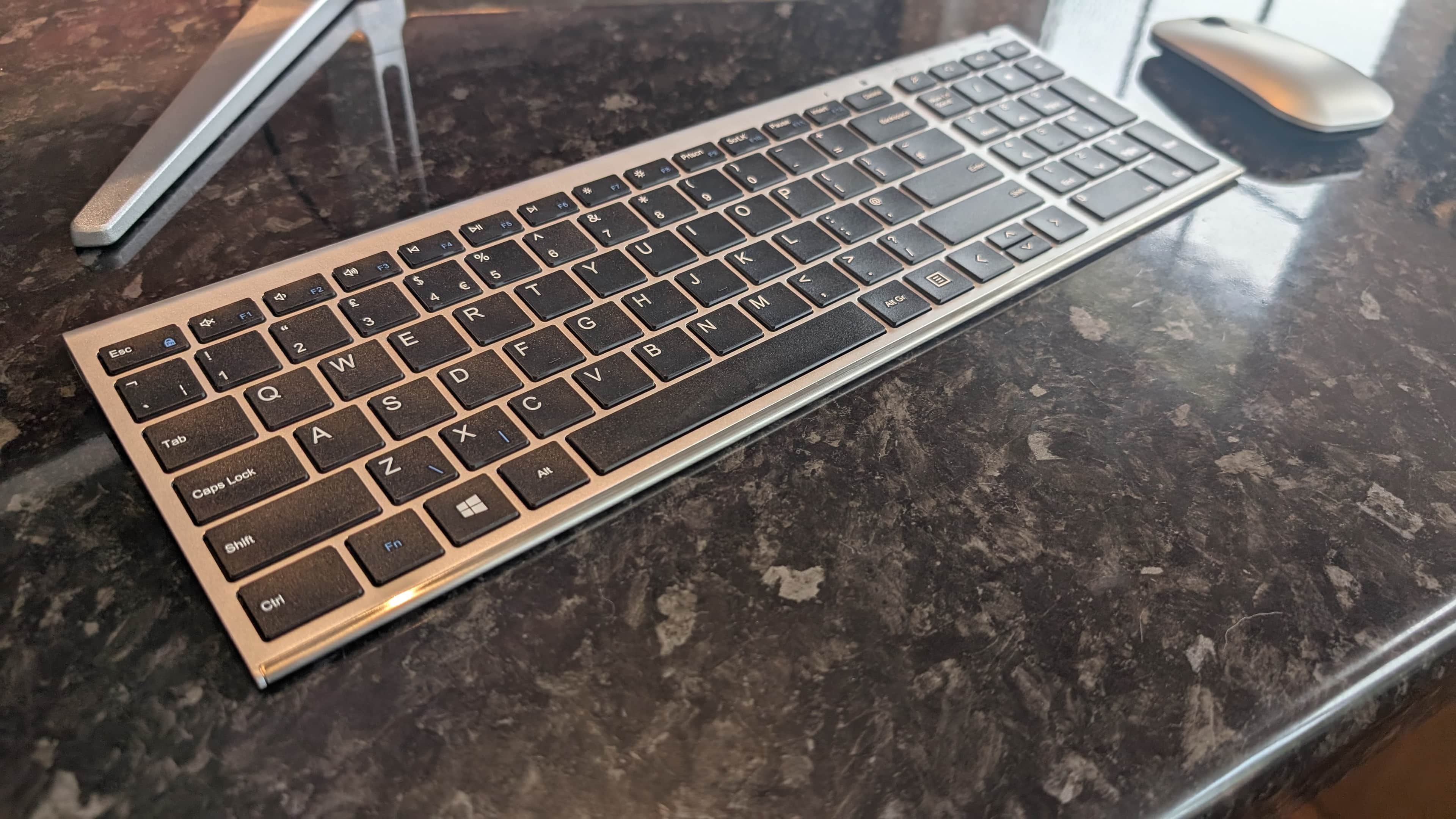The Medion Signium 27 S1 all-in-one desktop pictured on a marble worksurface.