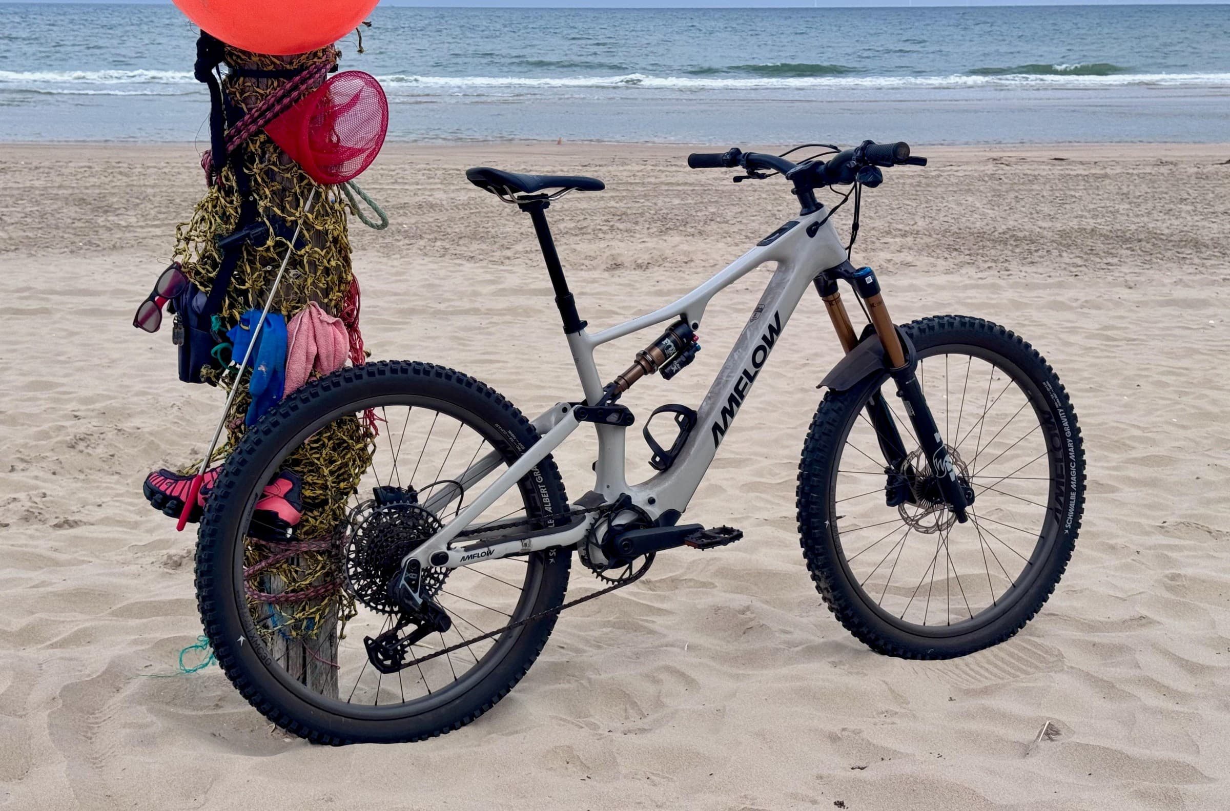 The Amflow PX Carbon Pro is not obviously an electric mountain bike because its motor is so small.