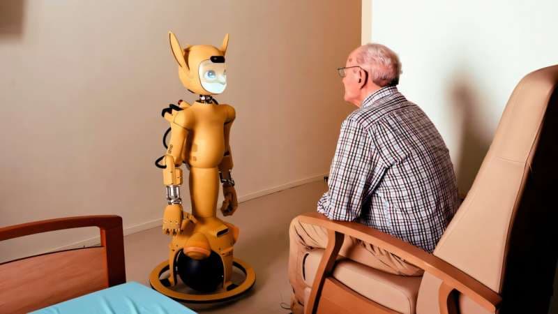 AI-enabled humanoid robots are being designed to provide emotional support and help with tasks such as dressing in long-term care homes for older people. Credit: Unsplash/Enchanted Tools