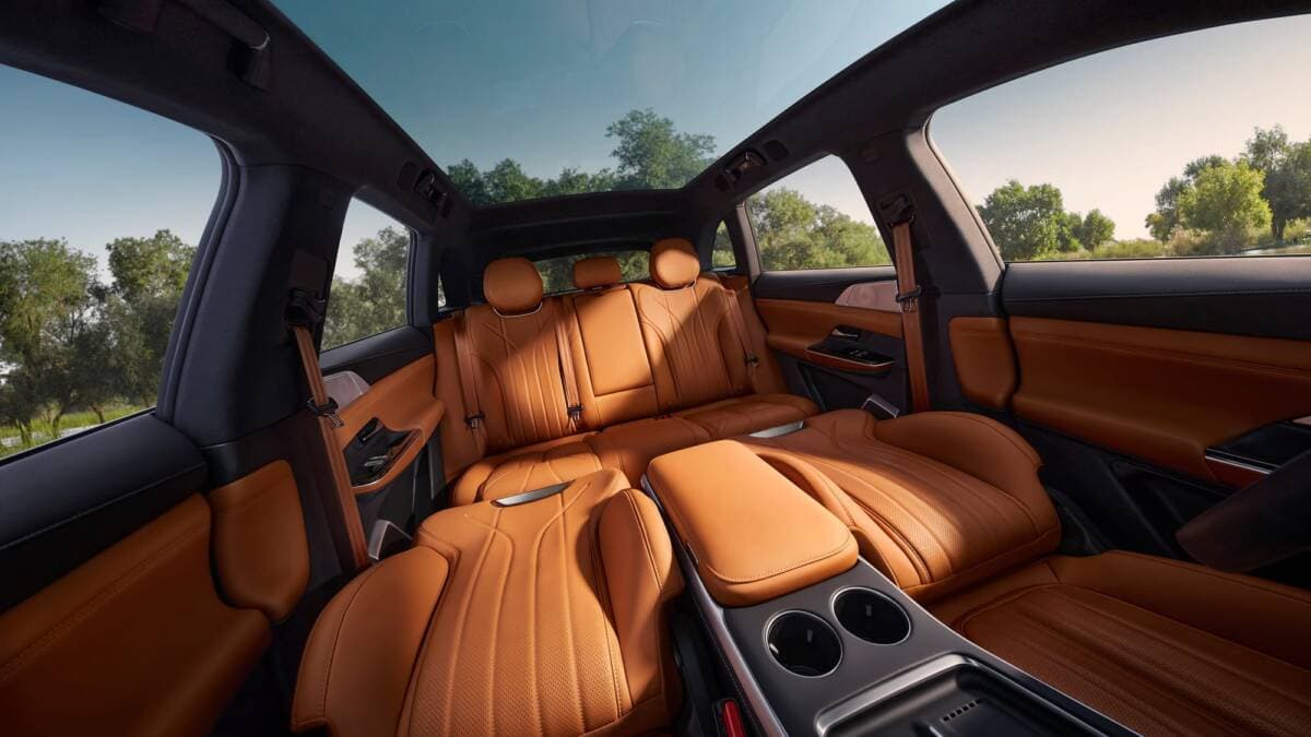 XPeng car interior with leather trim, a center console, and a media system