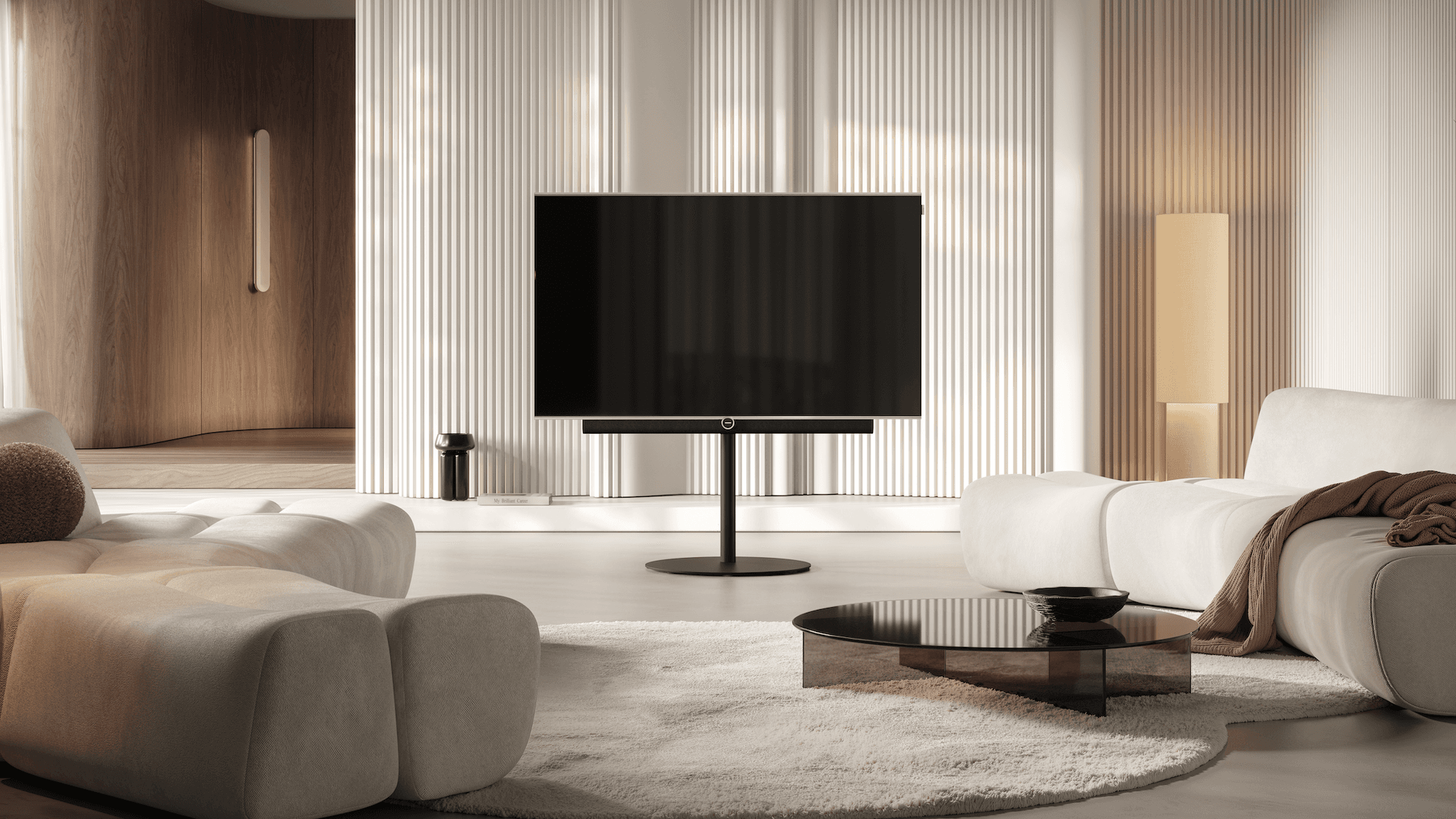 Lifestyle image of the Loewe Antares TV in a neutrally decorated living room