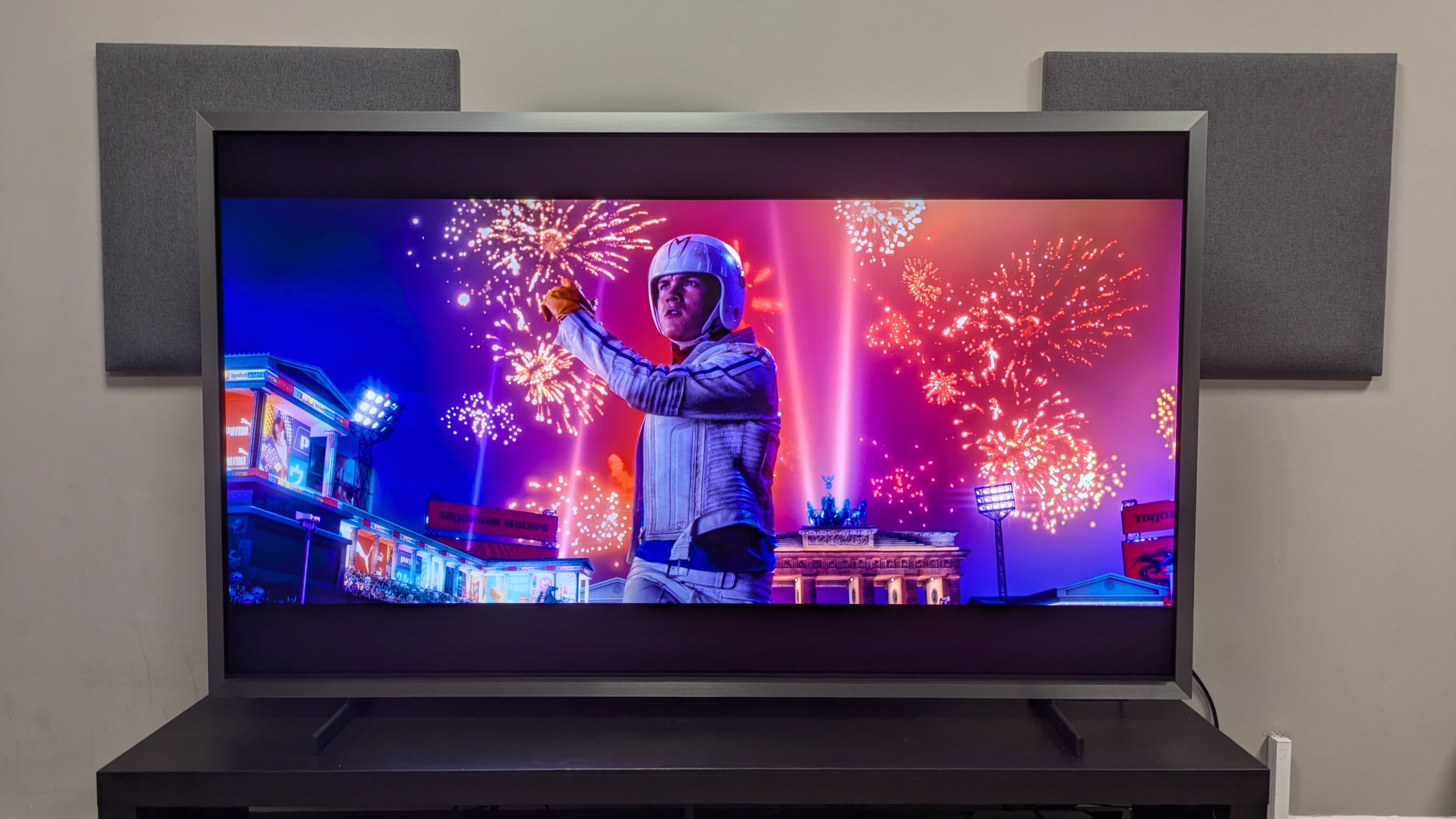 Samsung S95H showing a scene from *Speed Racer* with fireworks, highlighting vivid color reproduction