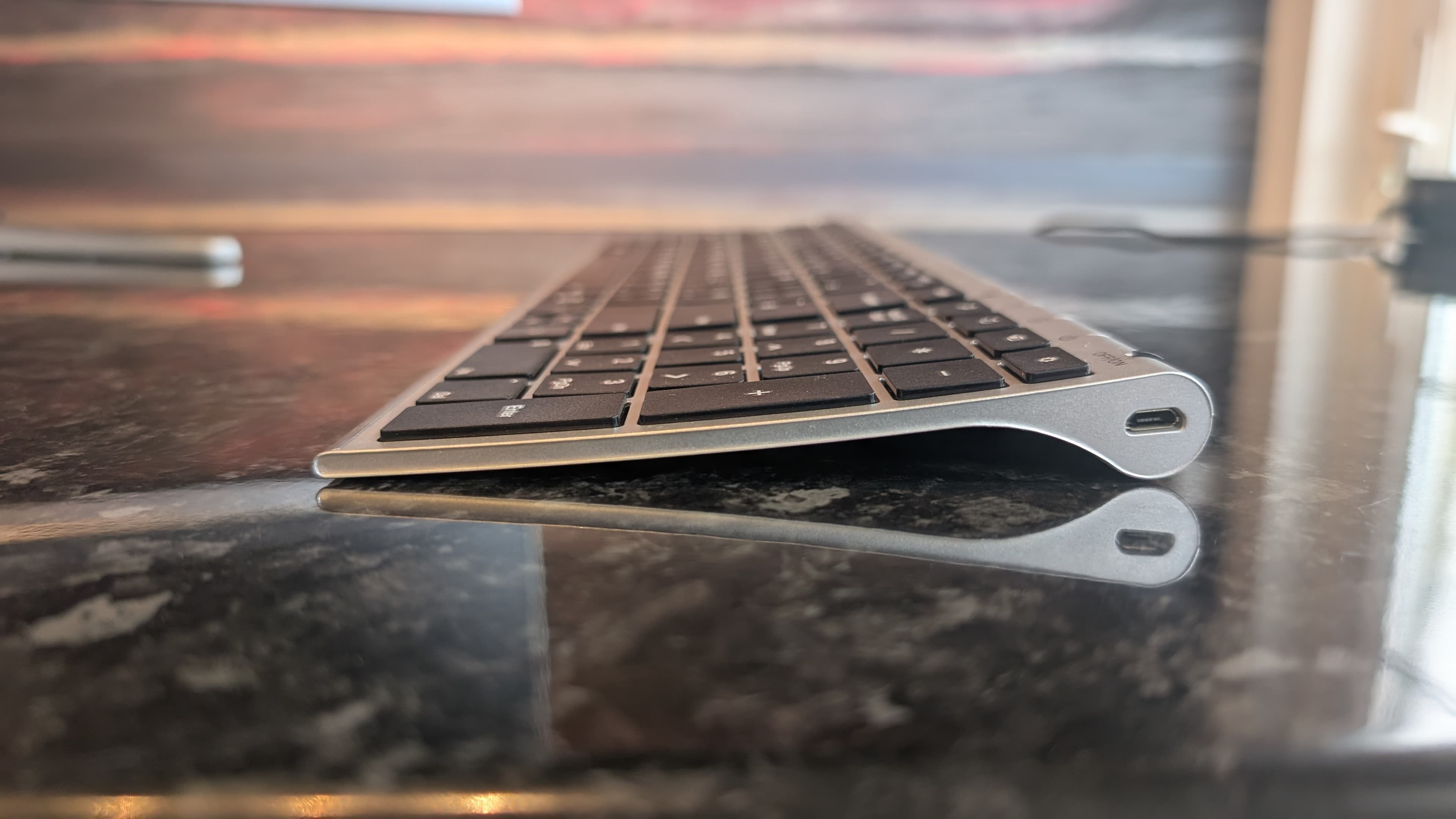The Medion Signium 27 S1 all-in-one desktop pictured on a marble worksurface.