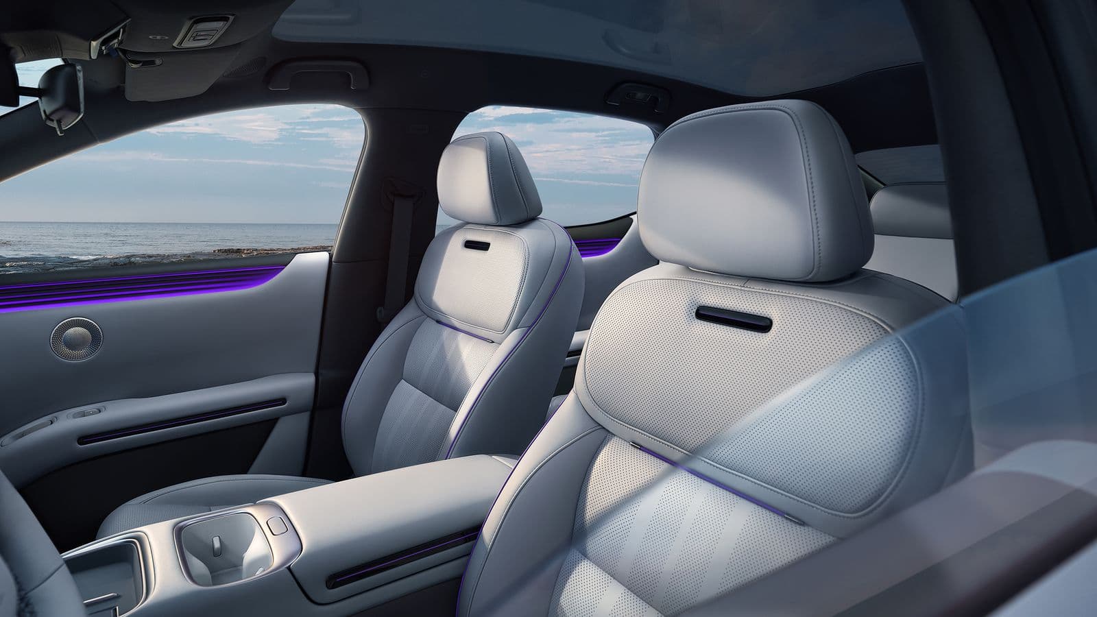 XPeng’s new budget EV headrest speakers in light gray. Photograph: Courtesy of XPeng