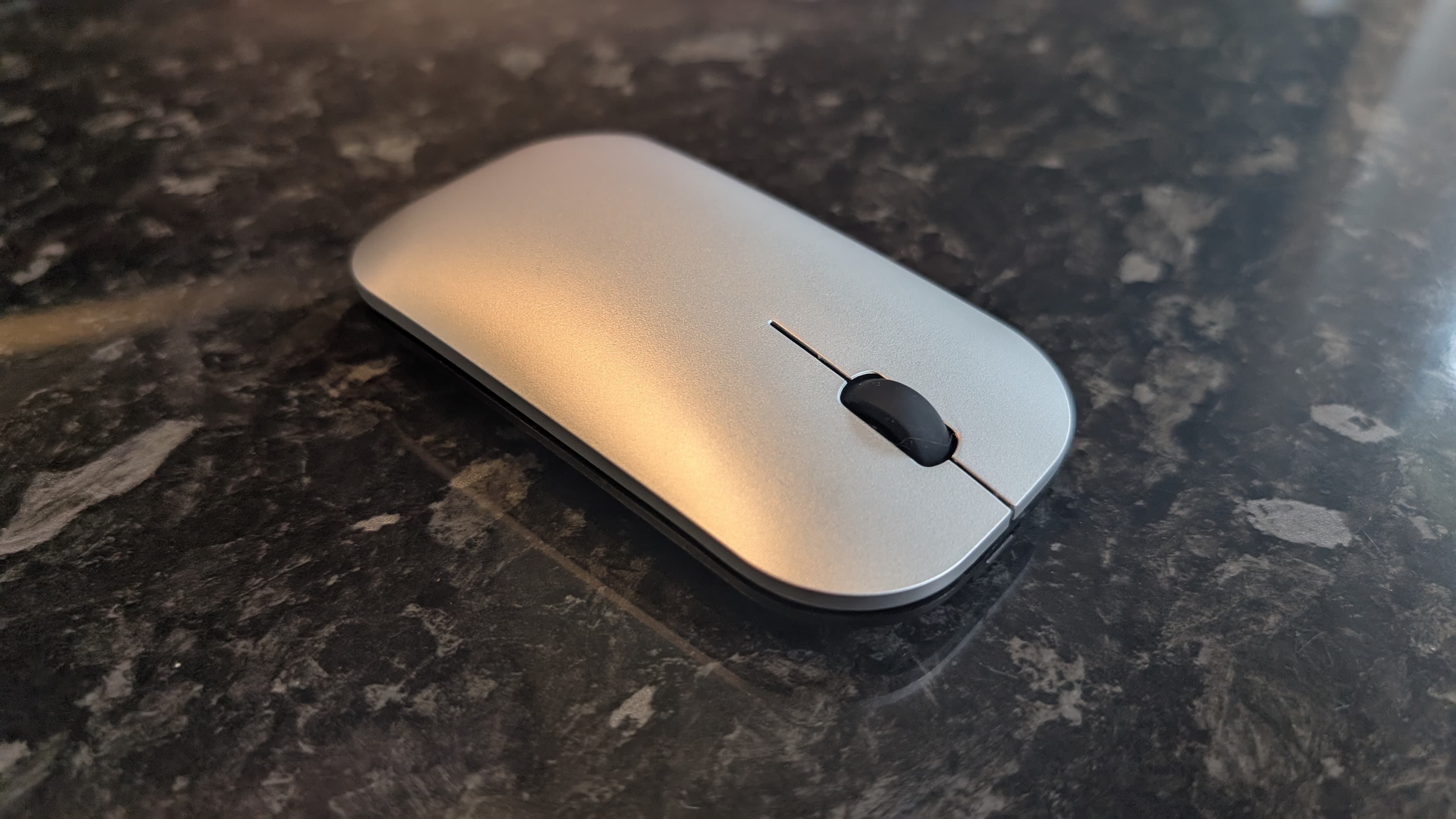 The Medion Signium 27 S1 all-in-one desktop pictured on a marble worksurface.