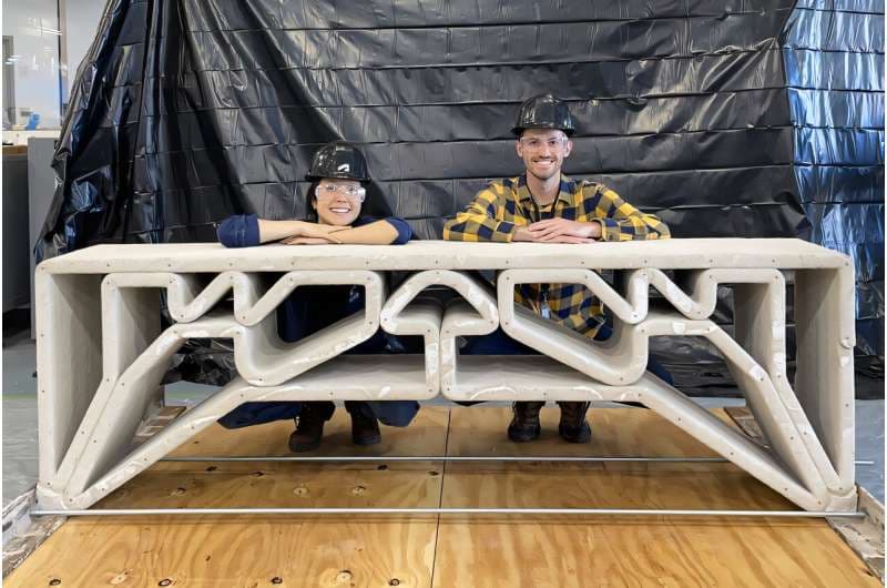 During testing, the roughly 900-pound bridge held more than 2,000 pounds of concrete blocks spread across its top without measurable bending, closely matching the simulations. Credit: Photo courtesy of the researchers.