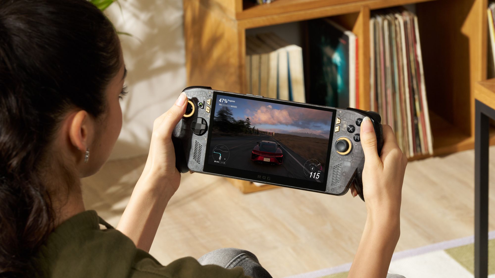 woman playing rog xbox ally x20 oled handheld gaming console
