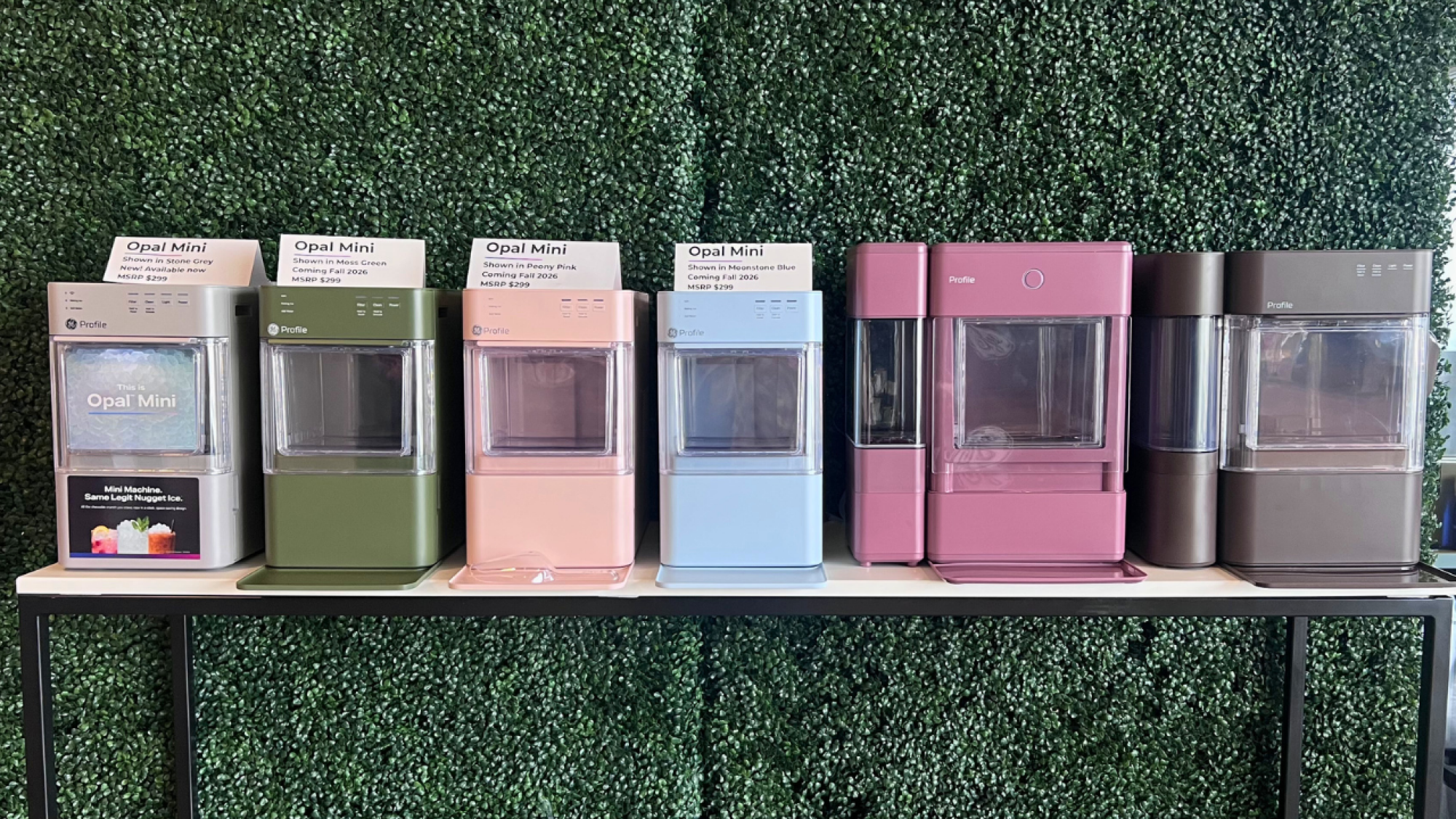 Opal Mini ice makers in grey, green, pink, and blue next to Opal Ultra ice makers in raspberry and grey.