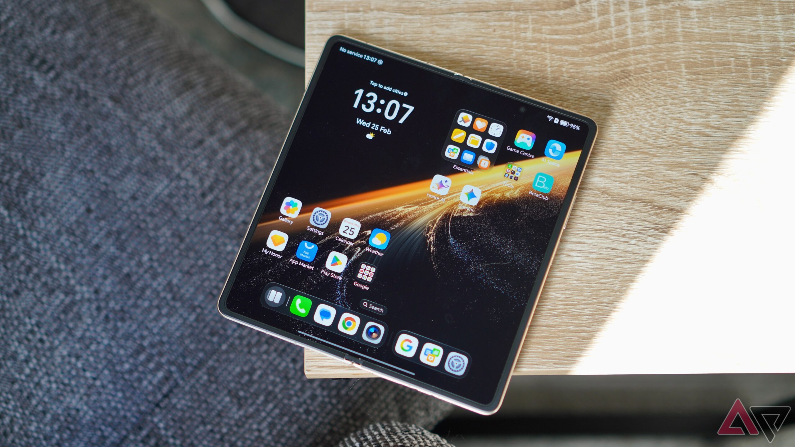 Honor Magic V6 foldable phone open on a table