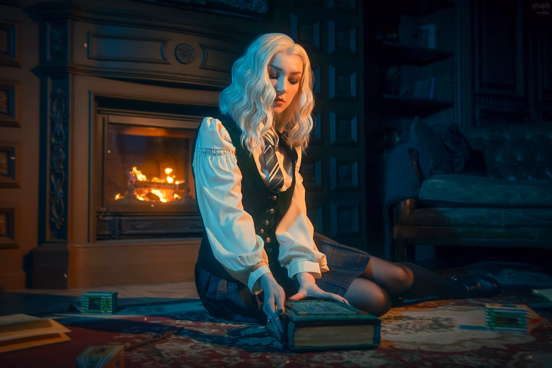 Model in school uniform by fireplace Russia