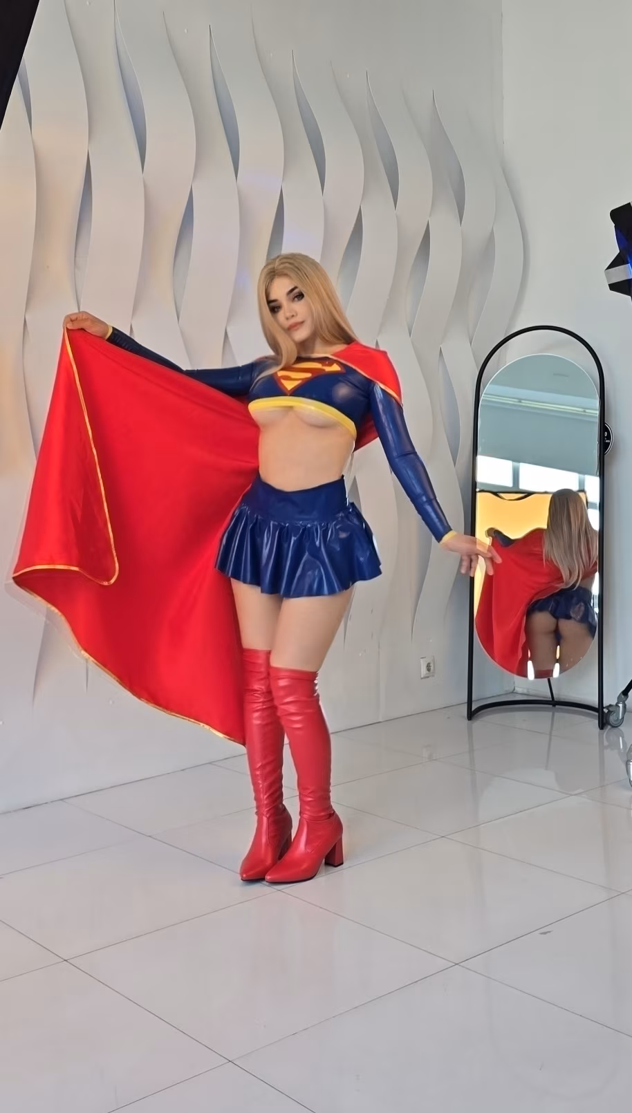 Kalinka Fox latex Supergirl cosplay with red cape