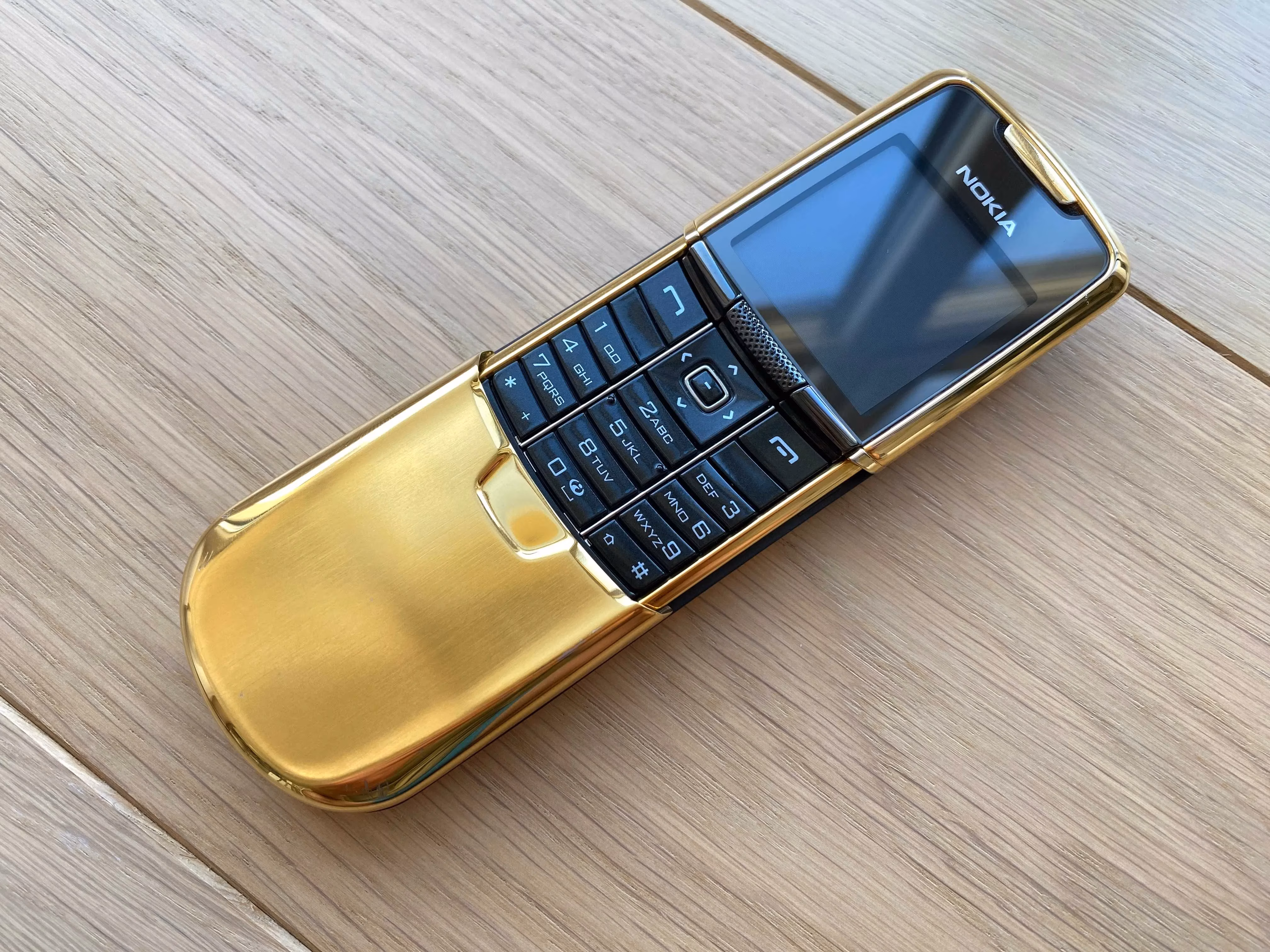 Gold Nokia Classic flip phone