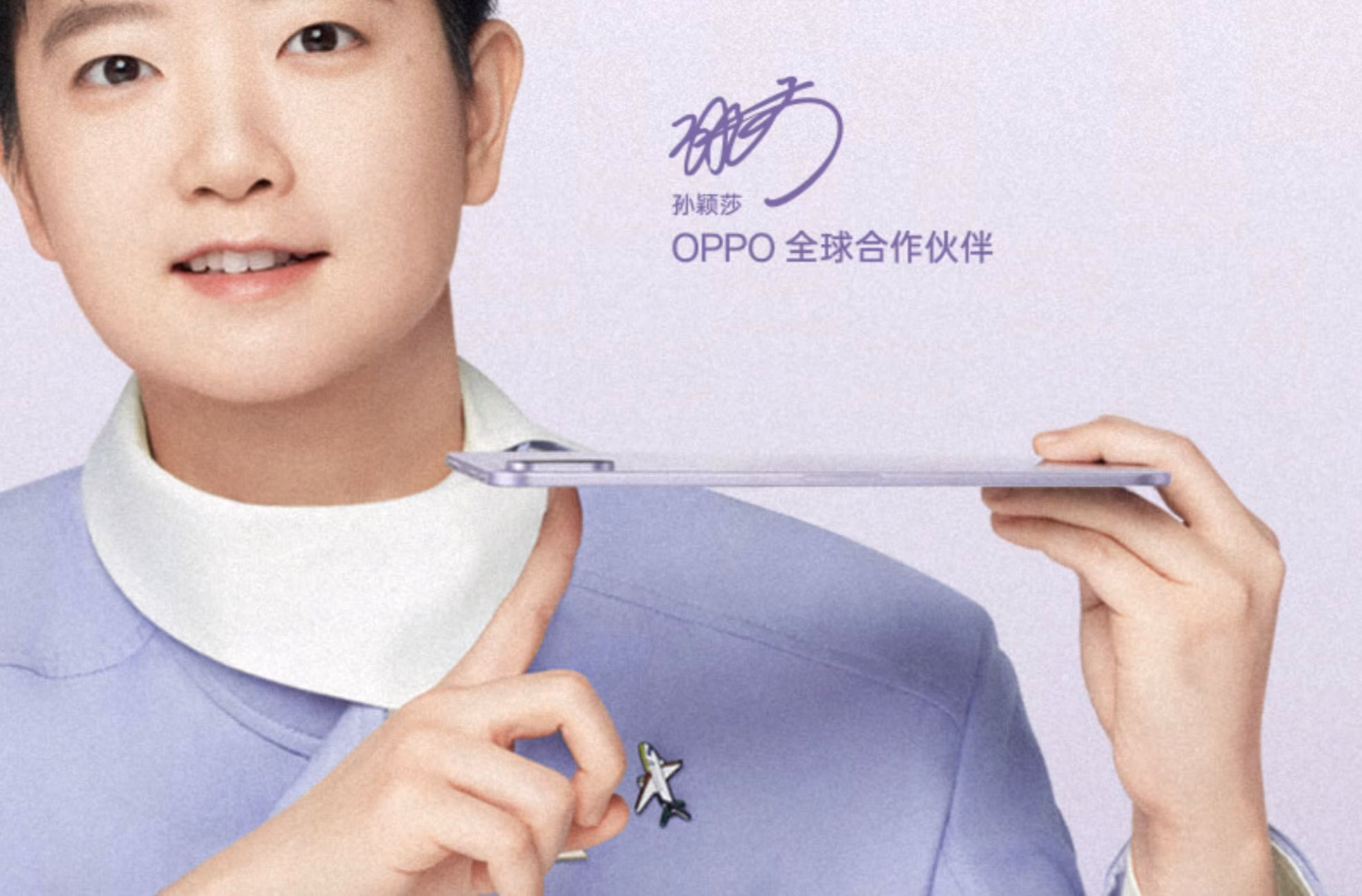 Close-up of person holding Oppo Pad Mini tablet