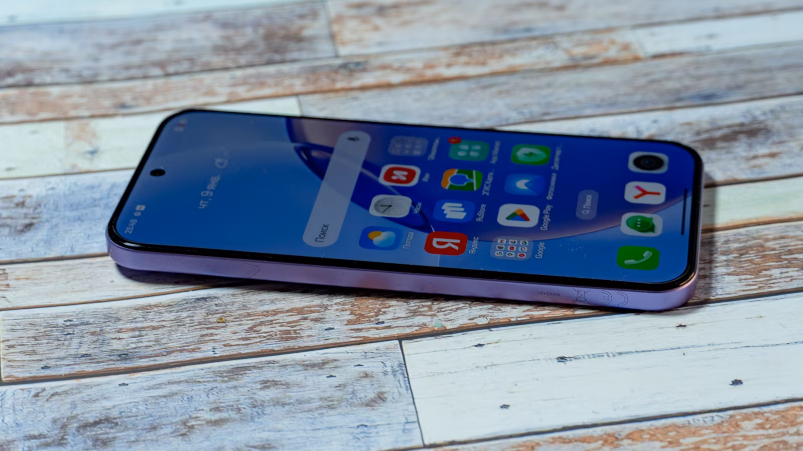 Realme 16 Pro 5G smartphone on wooden table