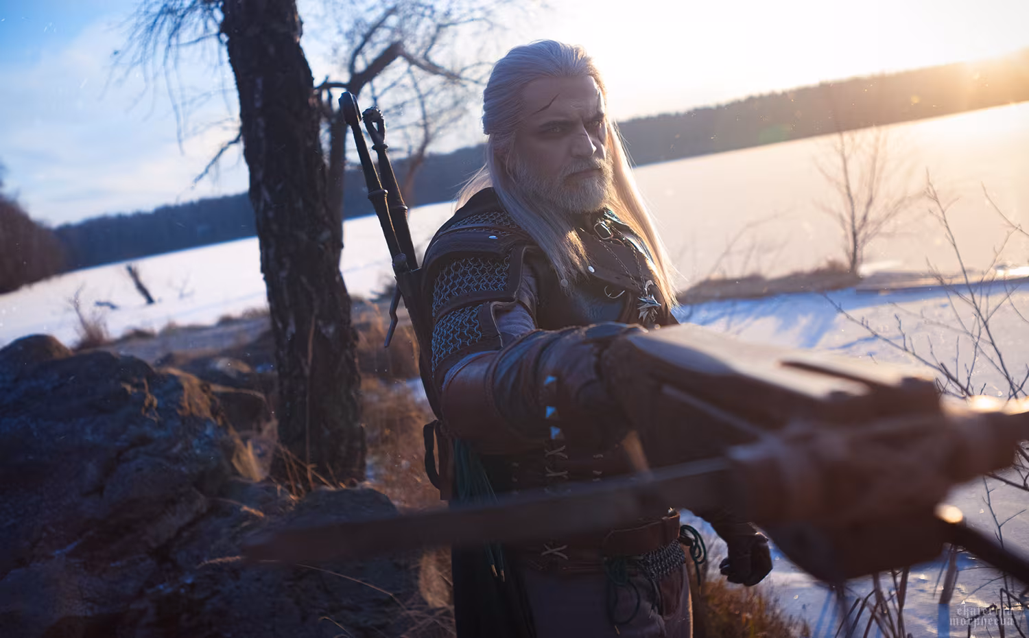 Man with long blond hair in knight costume