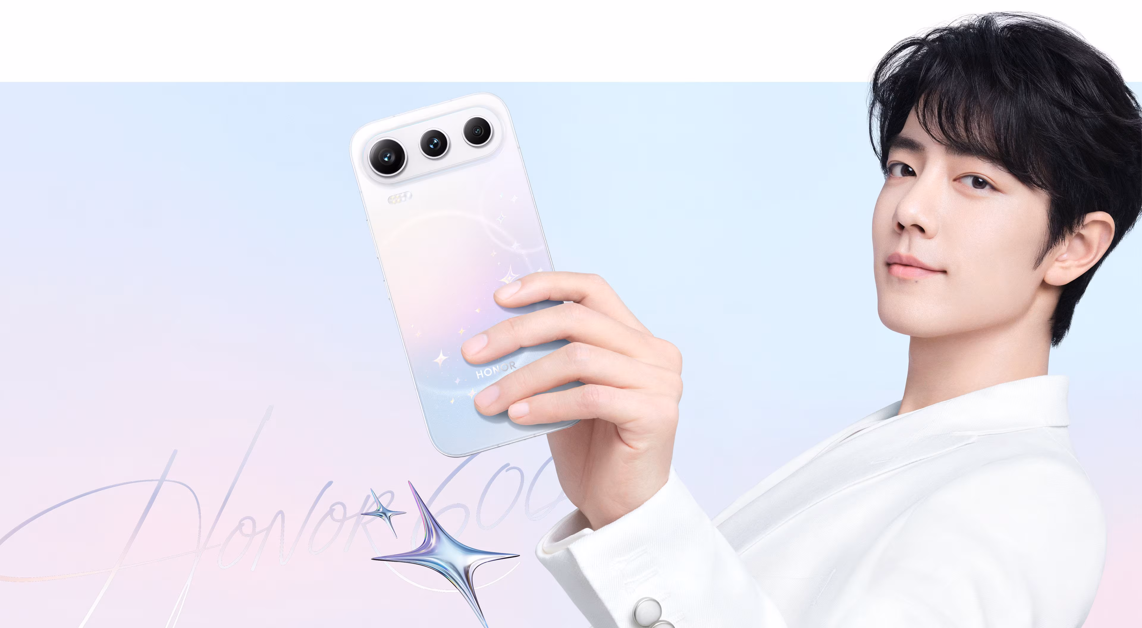 Young man holding Honor 600 smartphone