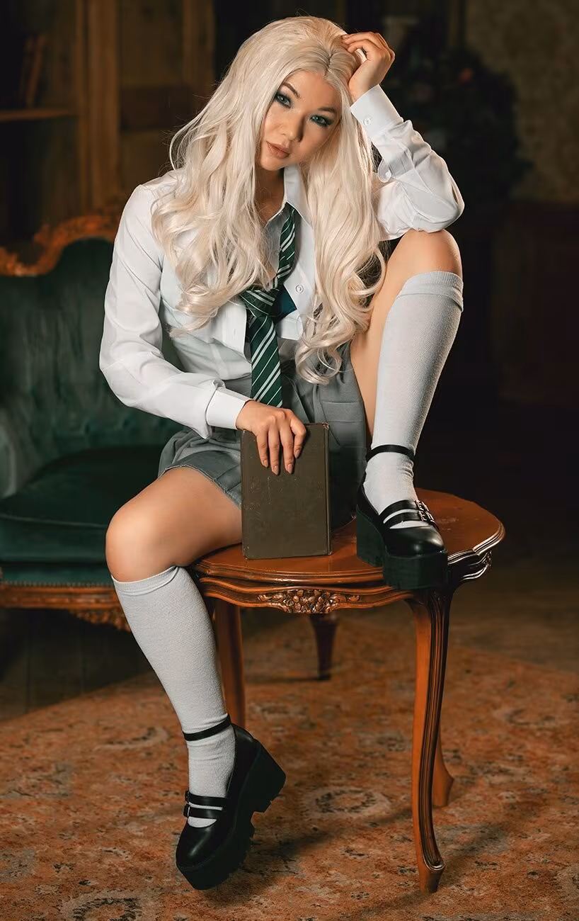 Model in school uniform with book and shoes cosplay