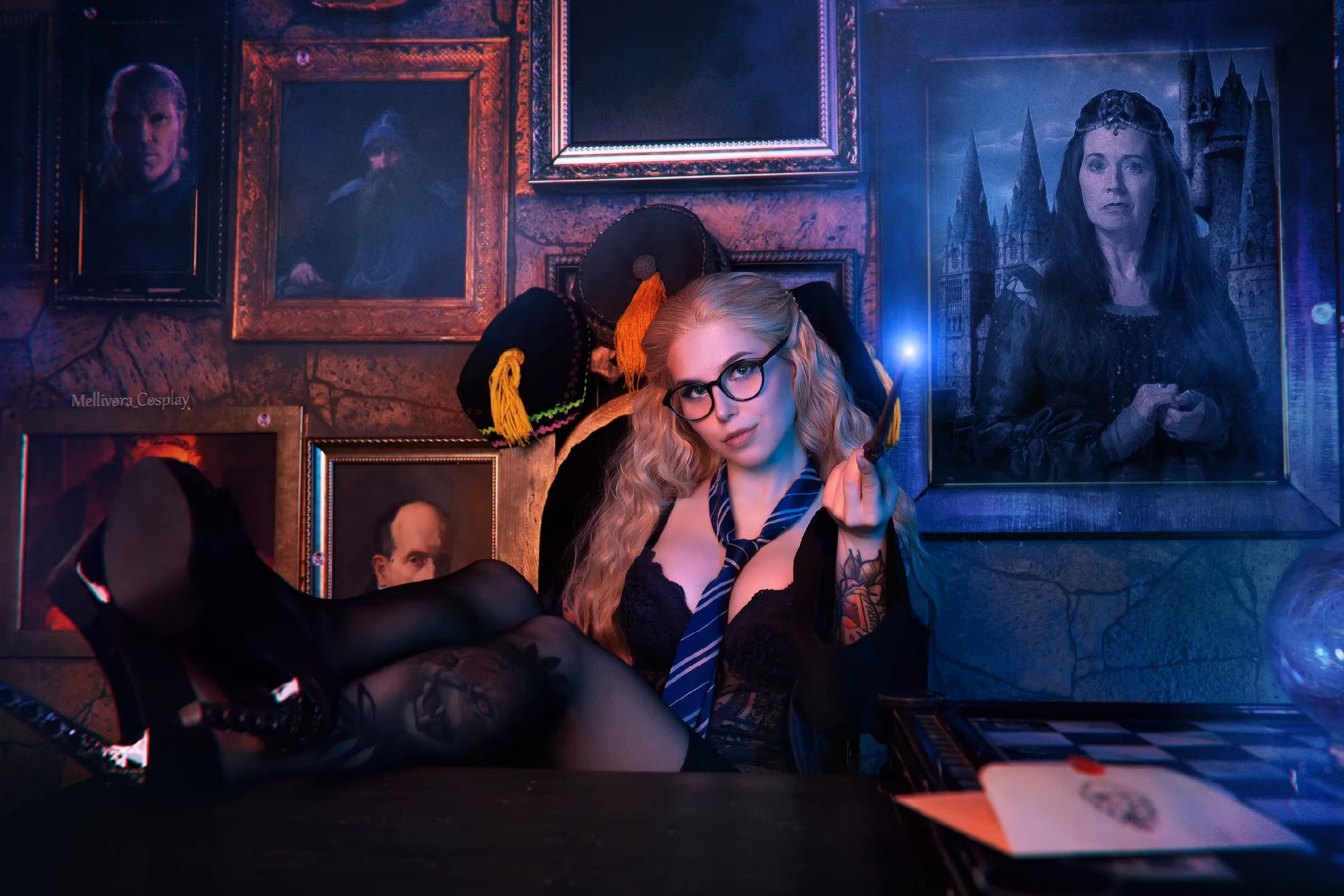 Three models in Slytherin and Ravenclaw cosplay