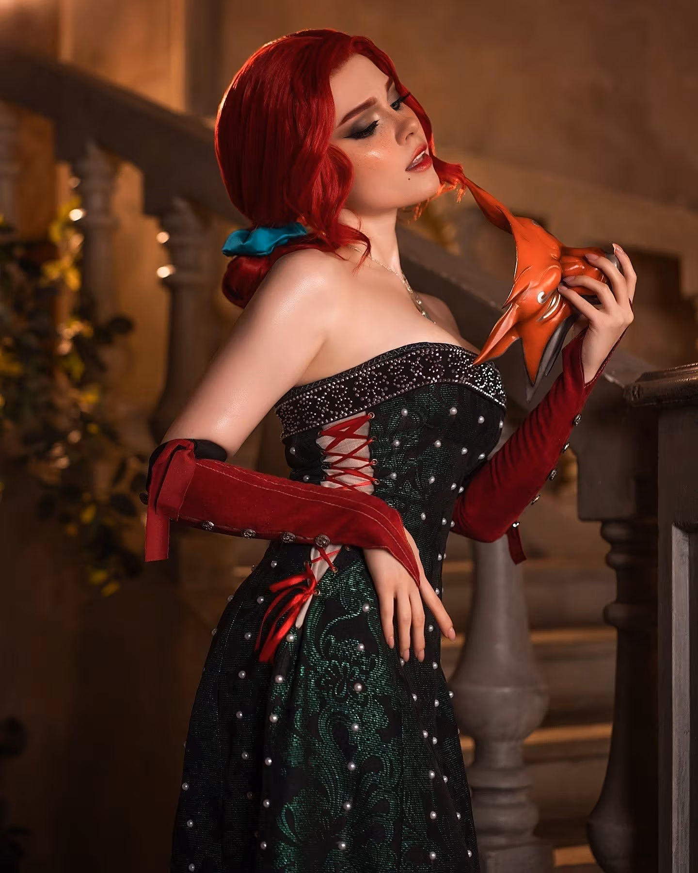 Russian cosplayer wearing Triss Merigold dress from The Witcher