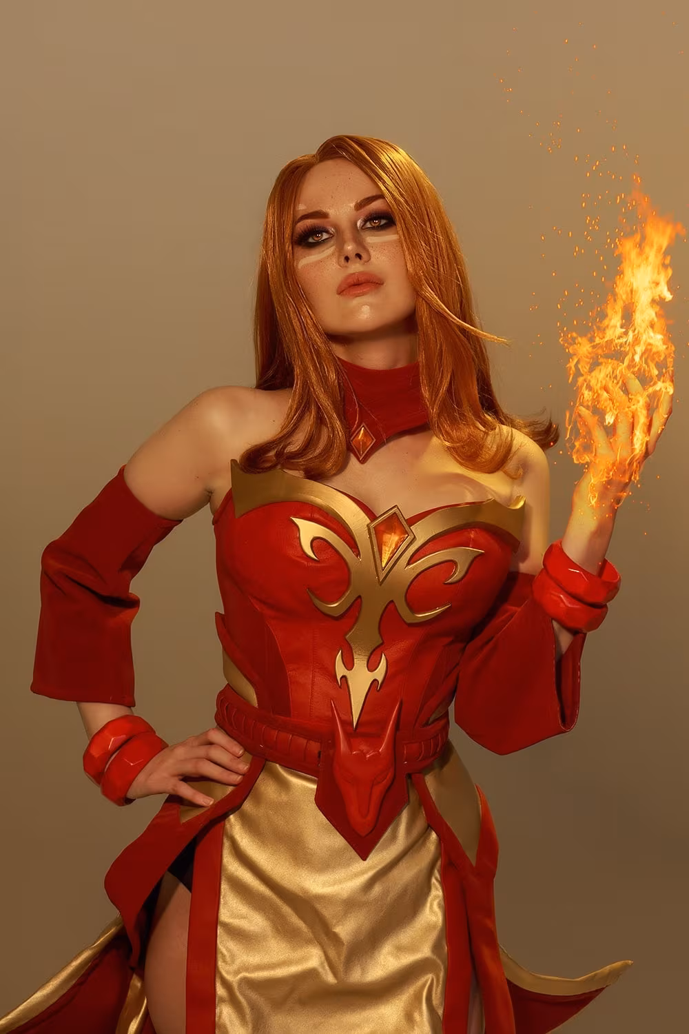 Model in Lina costume with fiery magic