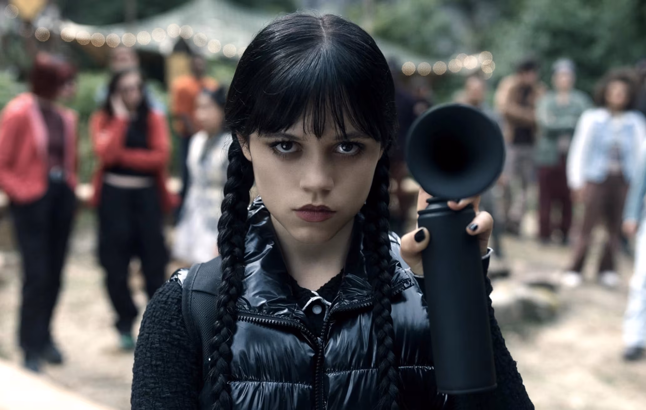 Russian model's Netflix Wednesday Addams cosplay with black jacket and braids