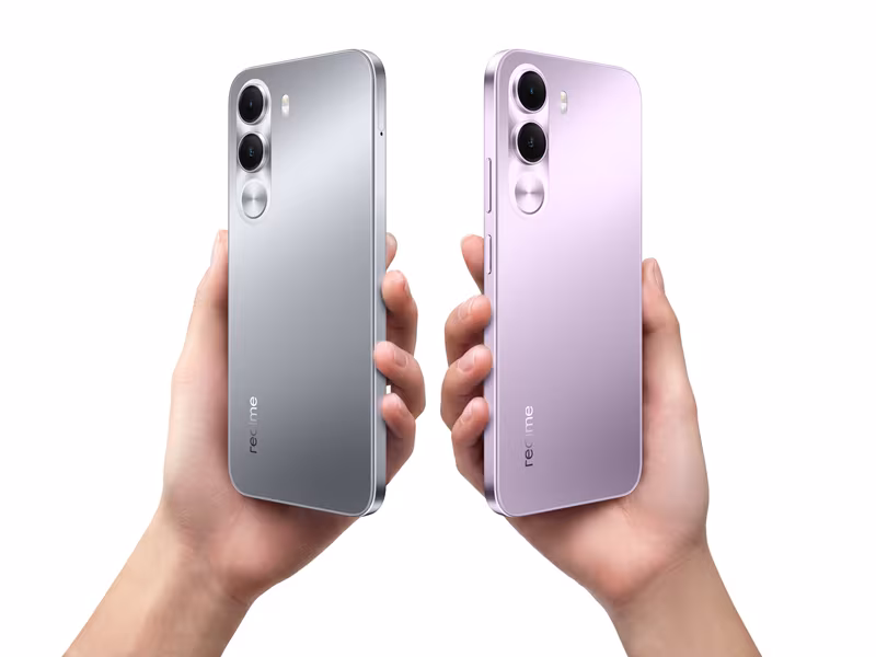 Two realme C100i phones held in hand