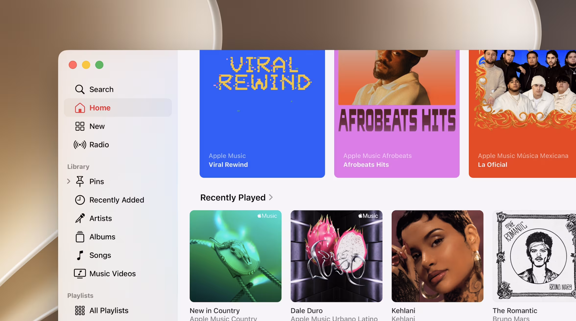 Apple Music view with sections Viral Rewind, Aerobeat Hits, Mexicana, La Oficial
