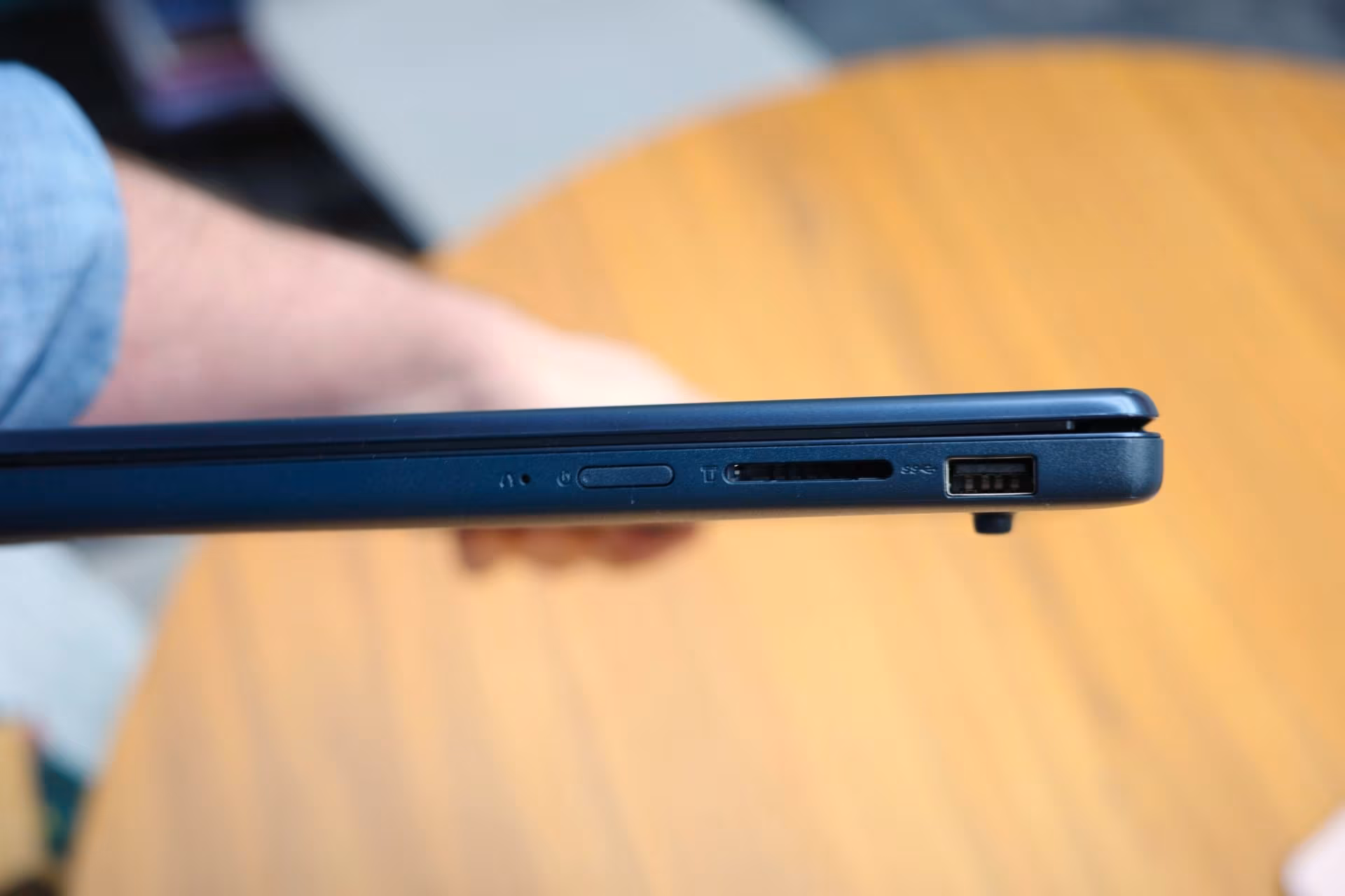 Side view of Lenovo laptop on table