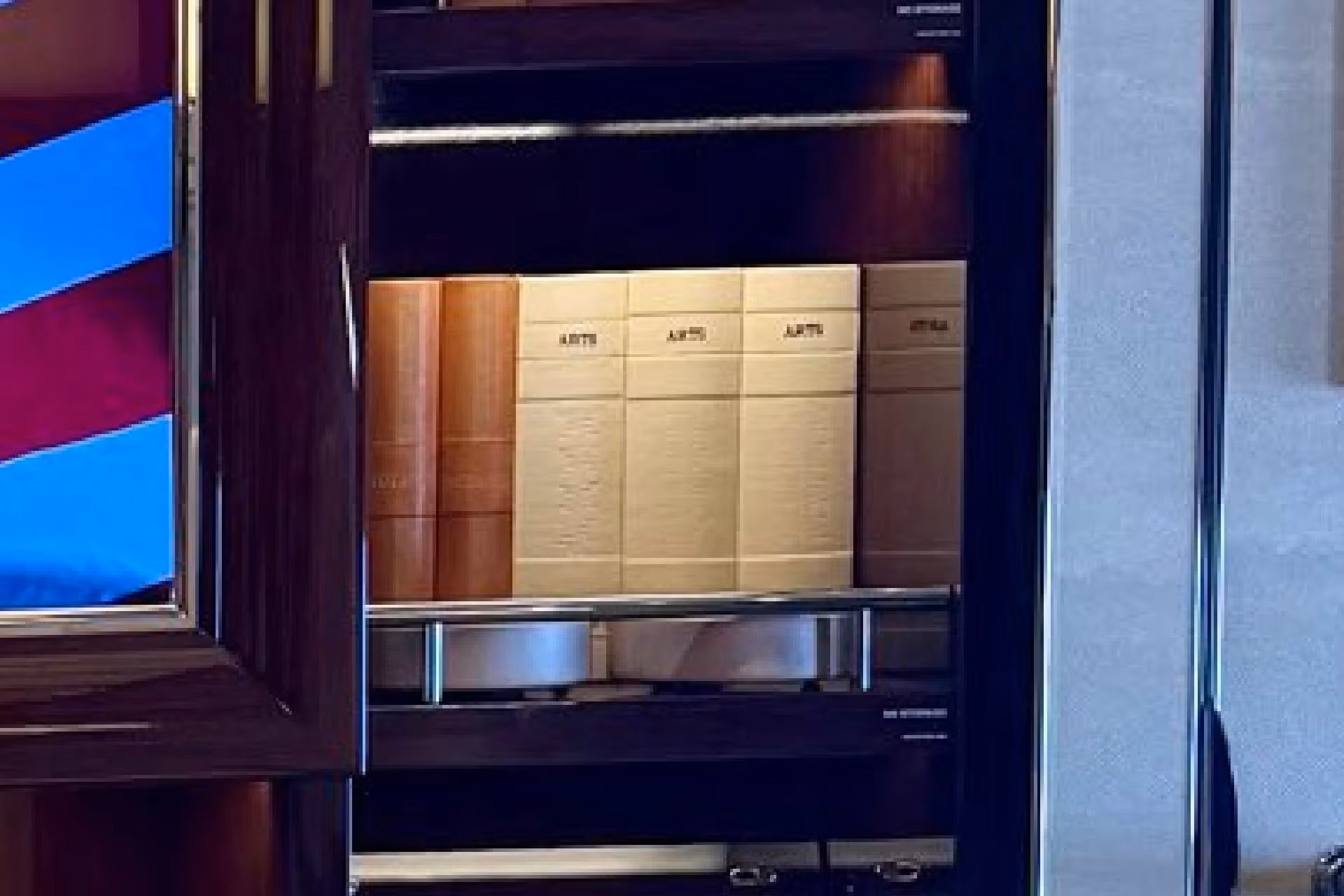 Wooden and metal-latched cabinet inside the new Air Force One