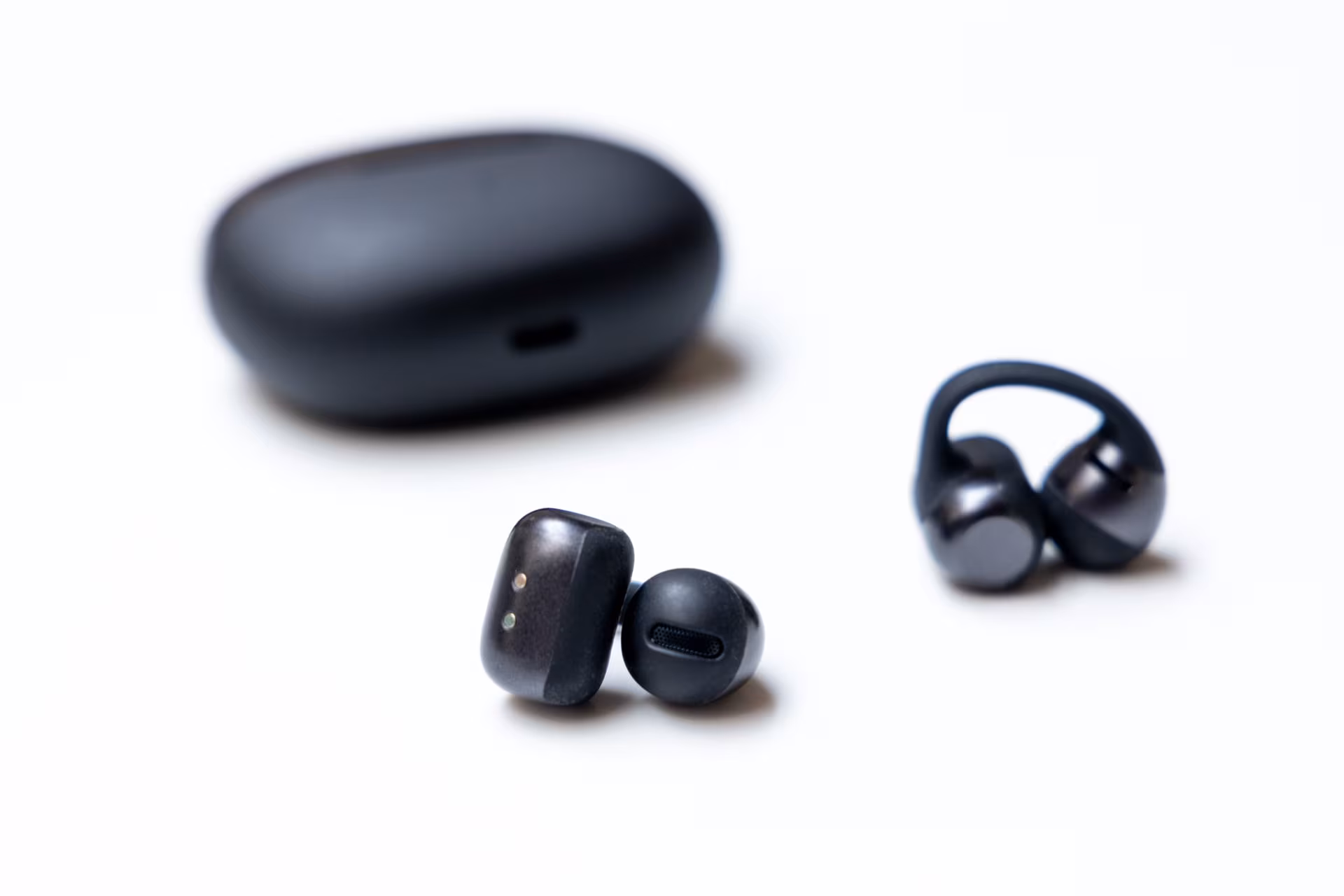 Wireless Shokz OpenDots 2 headphones with charging case